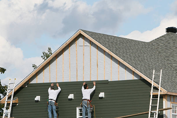 Professional Storm Damage Siding Repair technician working in Alexandria, PA